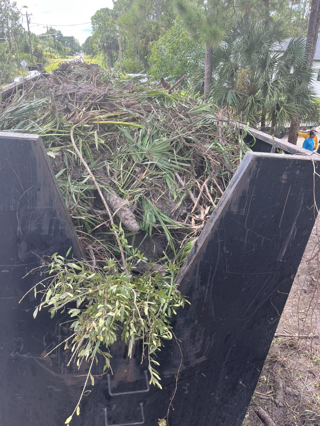 Debris removal with full truck bed